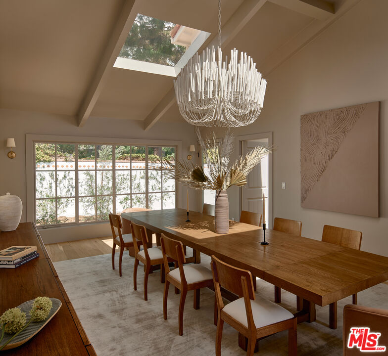 6930 Dume Drive Malibu, CA 90265 - Photo 10 of 34 a view of a dining room with furniture window and outside view