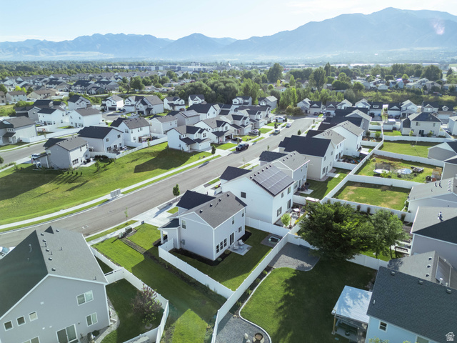 1486 West 2055th Street South Logan, UT 84339 - Photo 41 of 45 Aerial perspective showcasing a developed residential neighborhood with distant mountain ranges