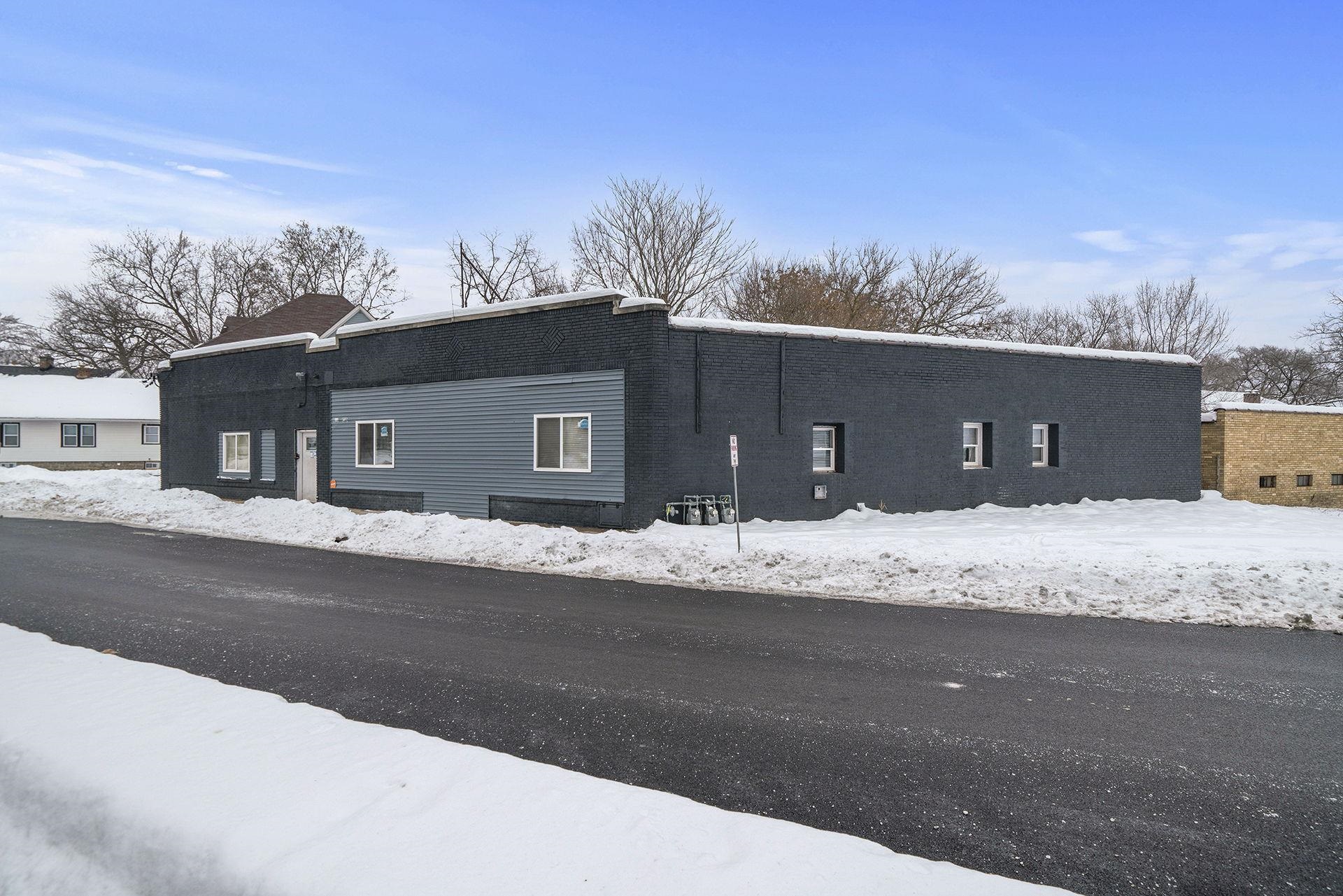 a house with trees in the background