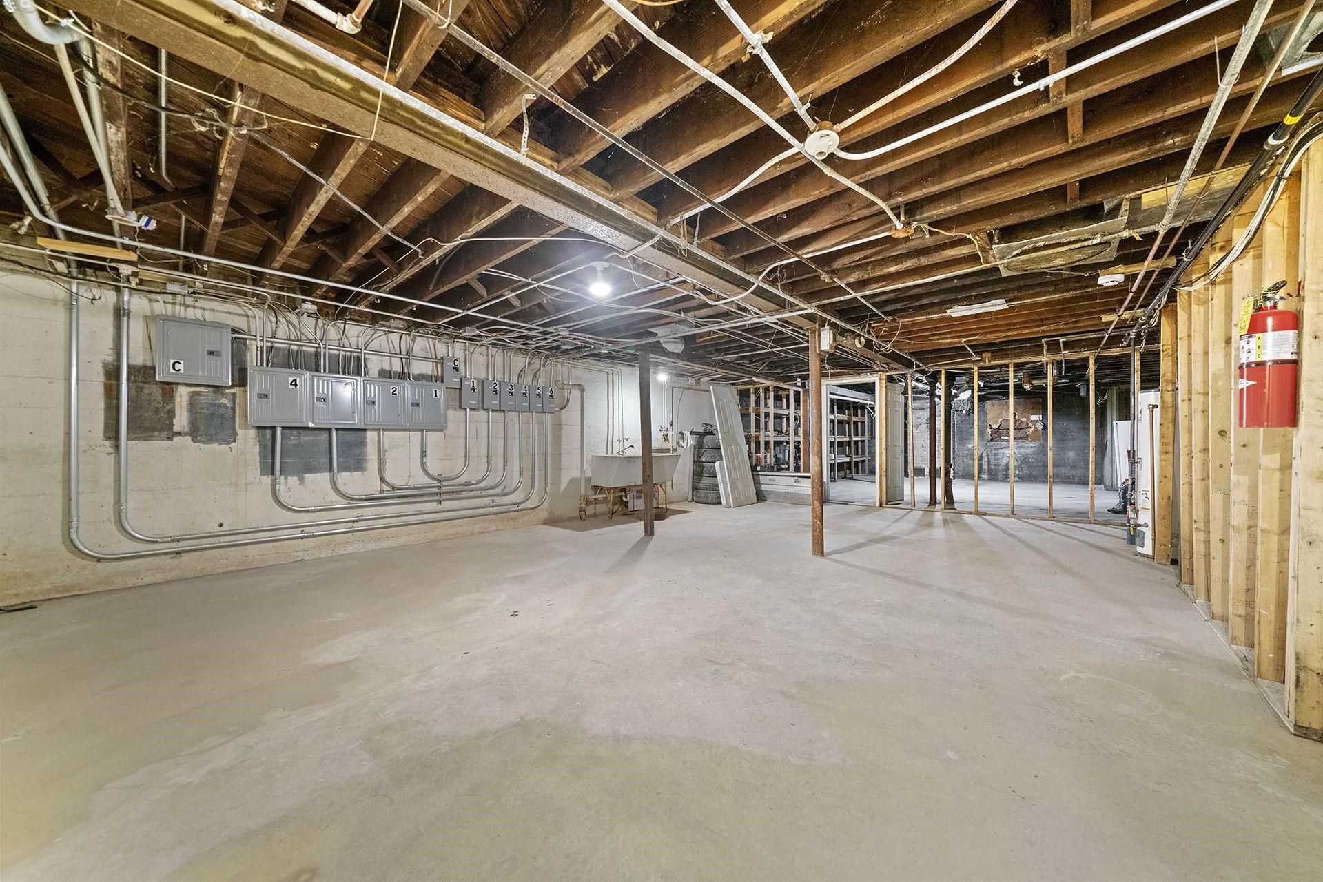 909-911 Ridge Avenue Rockford, IL 61103 - Photo 17 of 25 a view of an empty room with wooden roof