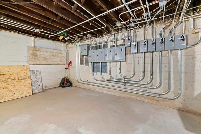 a view of empty room with wooden ceiling