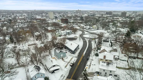 a view of city with ocean