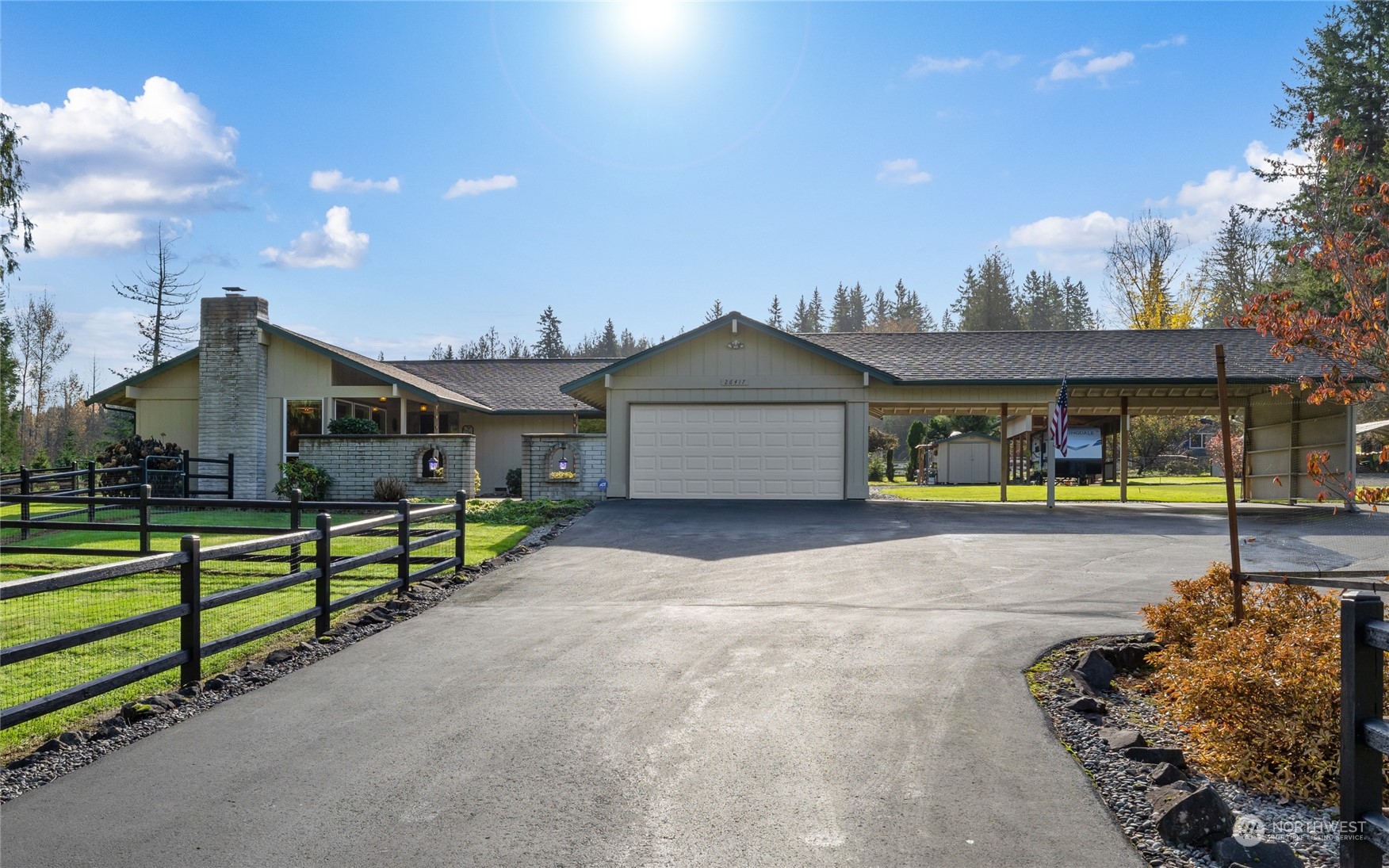 26417 Southeast 200th Street Maple Valley, WA 98038 - Photo 36 of 38 a view of an house with swimming pool and porch