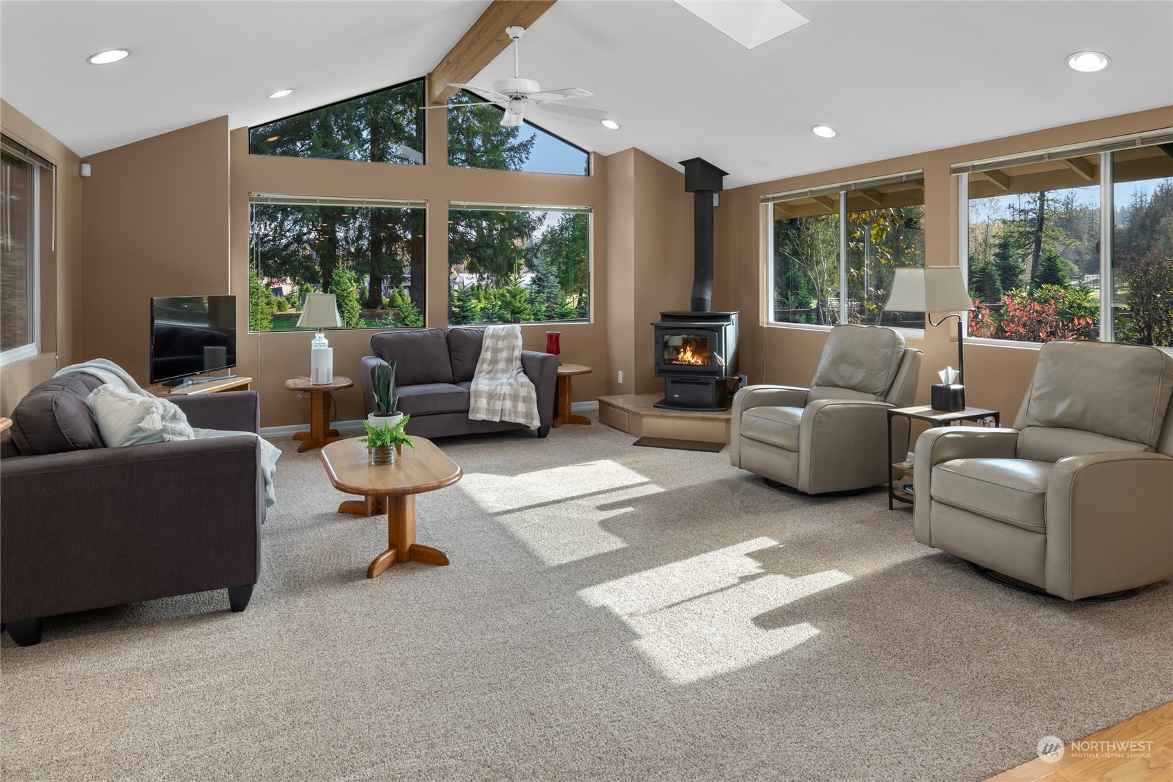 26417 Southeast 200th Street Maple Valley, WA 98038 - Photo 8 of 38 a living room with furniture and a large window