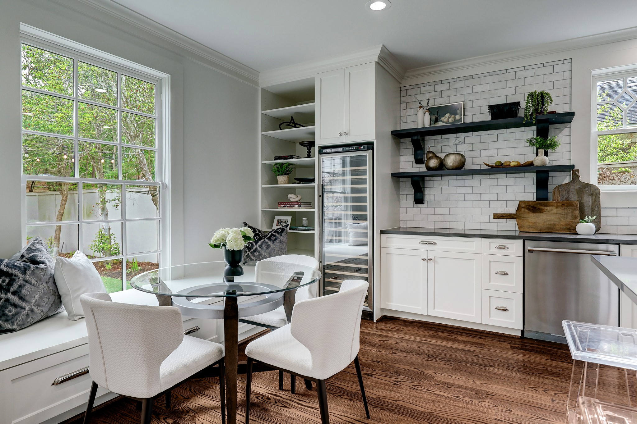 2027 Branard Street Houston, TX 77098 - Photo 17 of 36 a kitchen with a table and chairs