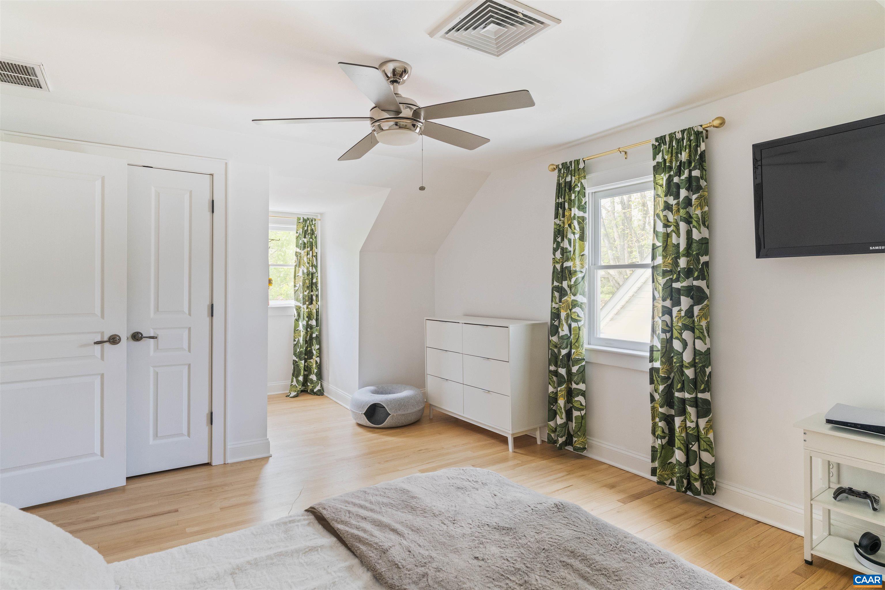 738 Lexington Avenue Charlottesville, VA 22902 - Photo 15 of 34 a view of livingroom with hardwood floor and ceiling fan