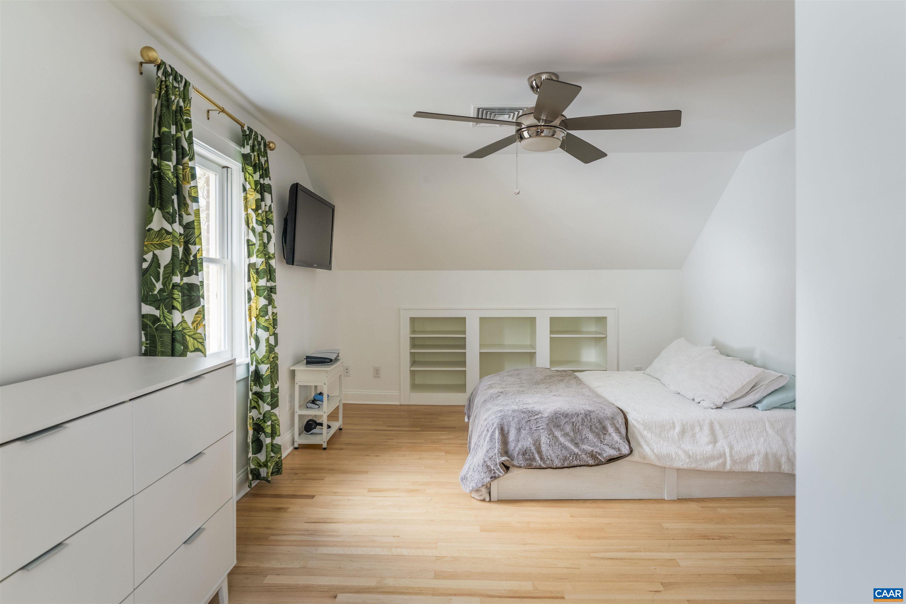 738 Lexington Avenue Charlottesville, VA 22902 - Photo 16 of 34 a bedroom with a large bed and a window