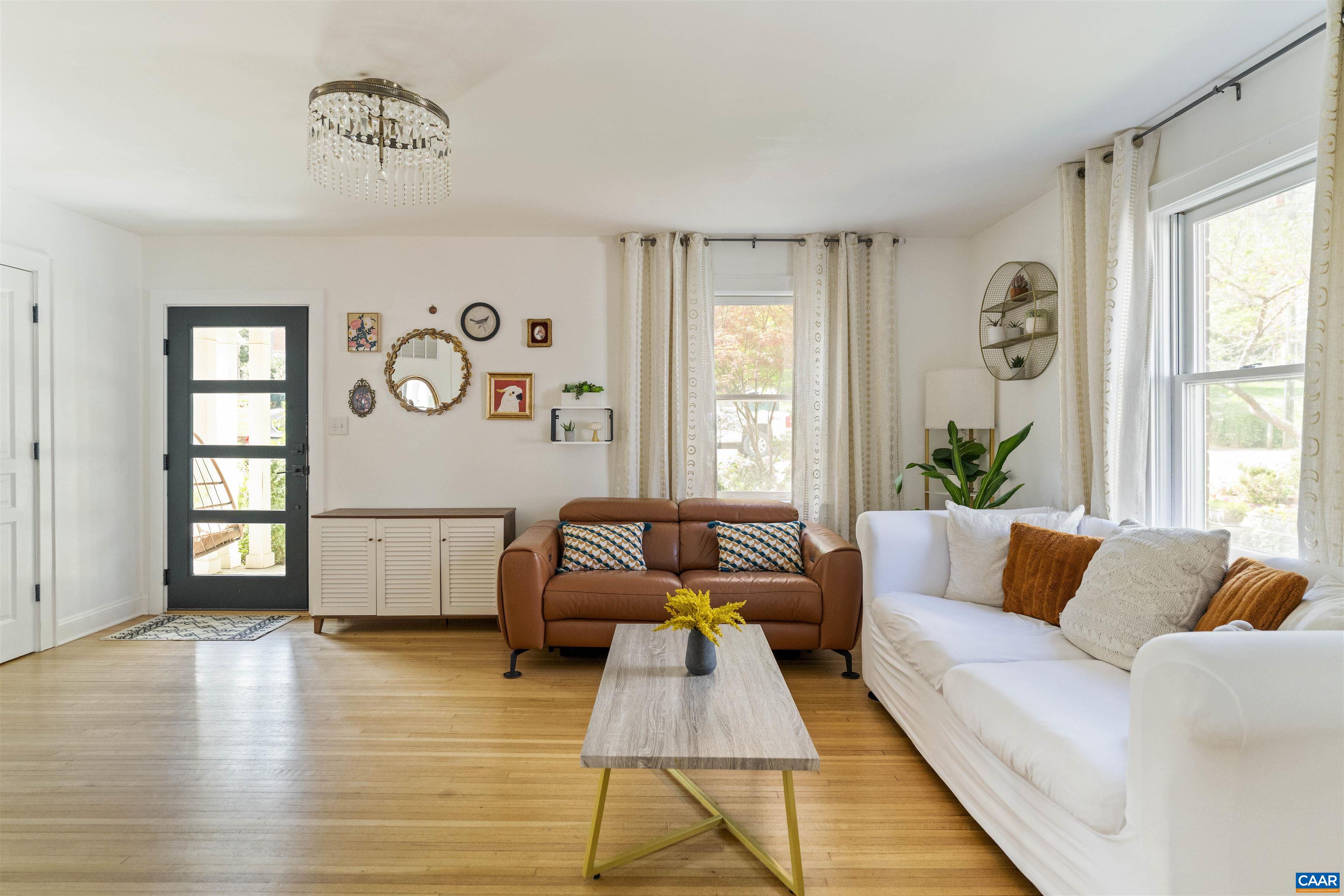 738 Lexington Avenue Charlottesville, VA 22902 - Photo 8 of 34 a living room with furniture and wooden floor