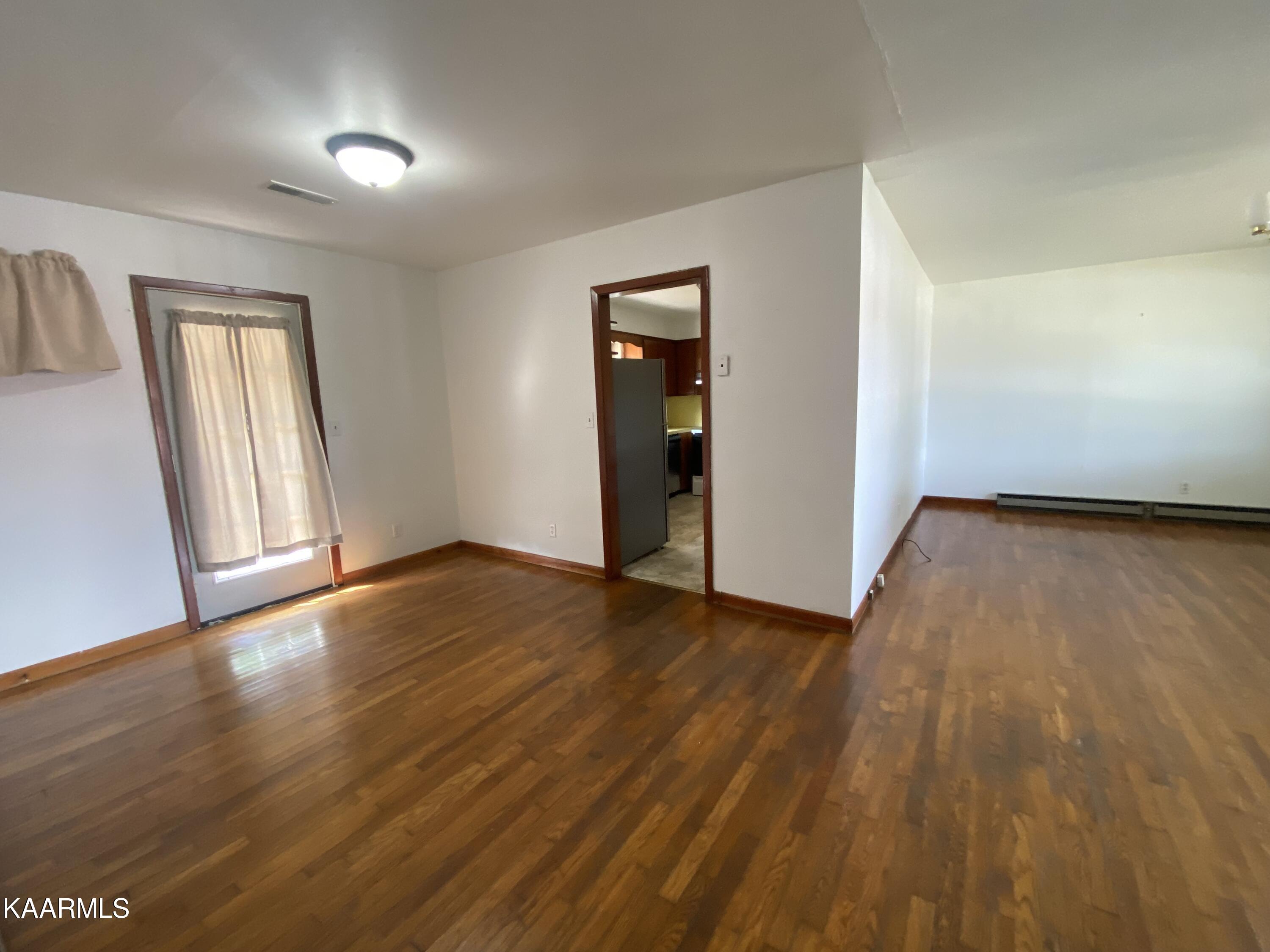 330 Forge Ridge Road Harrogate, TN 37752 - Photo 6 of 16 dining room extends to living room