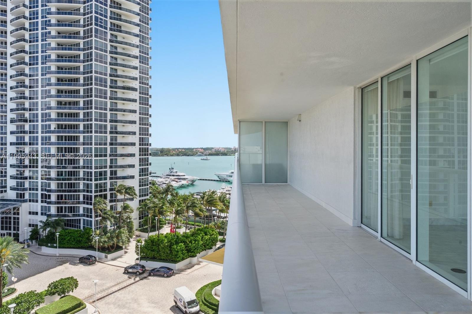 450 Alton Road, Unit 910 Miami Beach, FL 33139 - Photo 4 of 59 a view of a city from a corridor