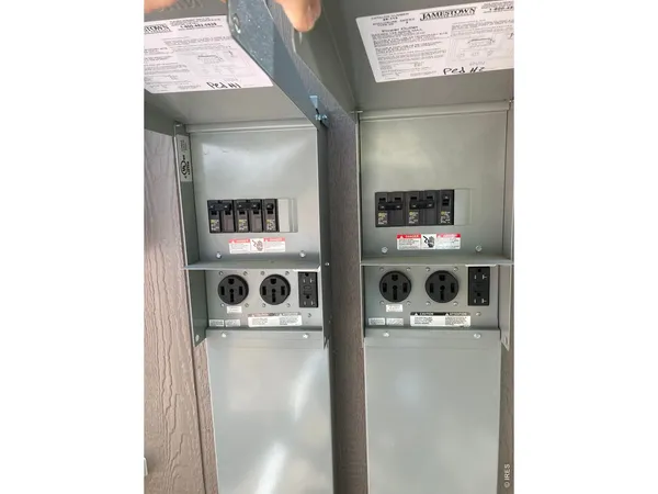 a close up of a utility room with washer and dryer