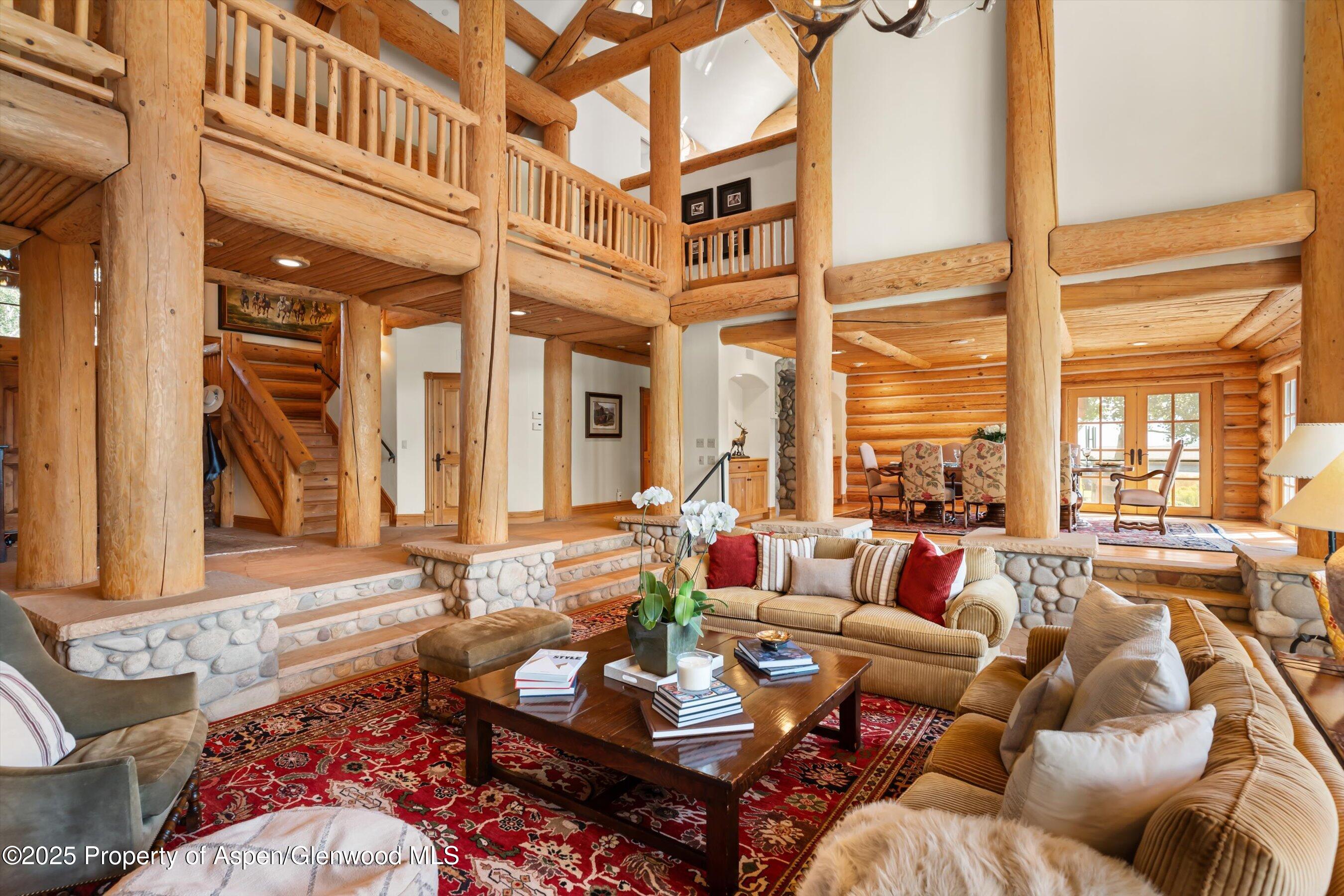 1301 Shield O Road Snowmass, CO 81654 - Photo 19 of 58 Great Room with Log Beams