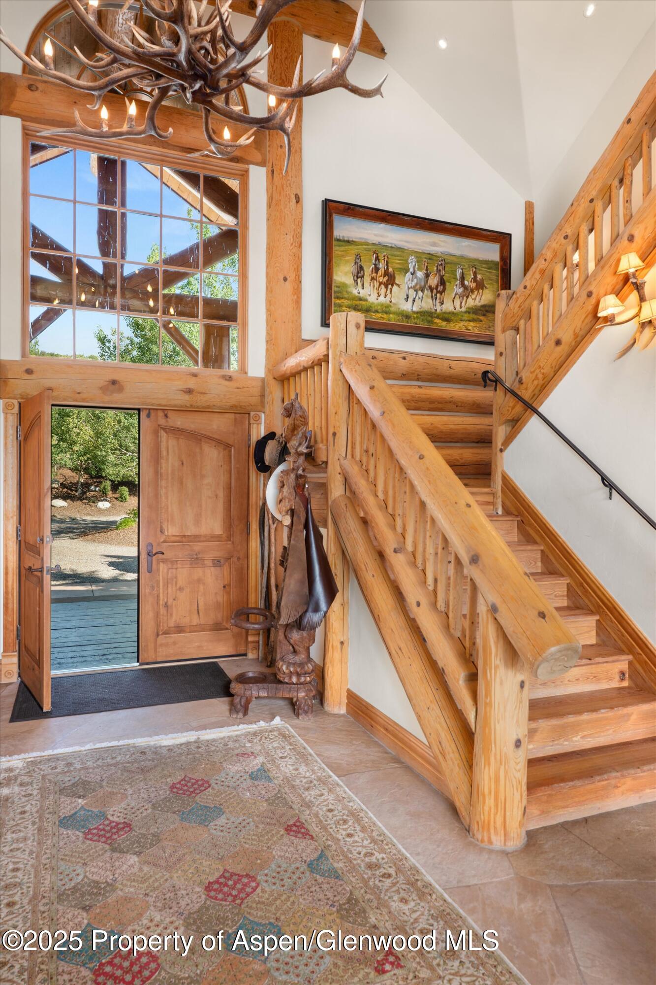1301 Shield O Road Snowmass, CO 81654 - Photo 35 of 58 a view of an entryway with a building