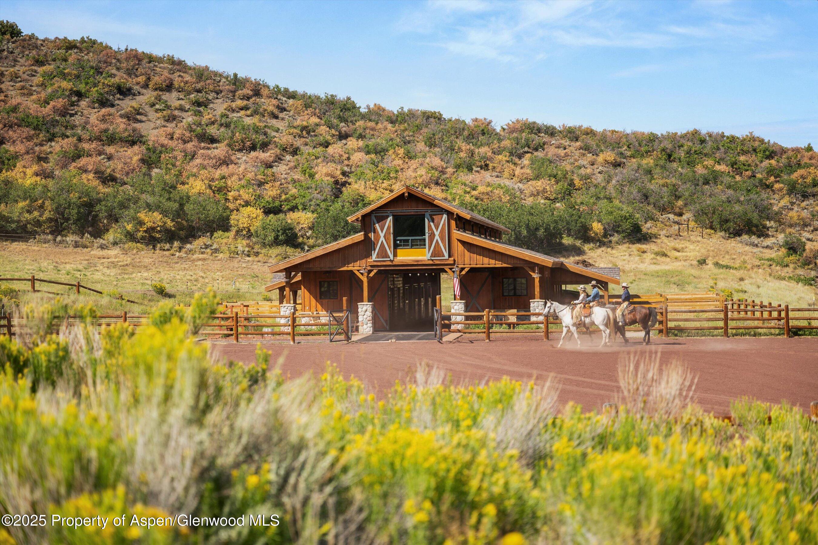 1301 Shield O Road Snowmass, CO 81654 - Photo 51 of 58 a view of a house with a big yard
