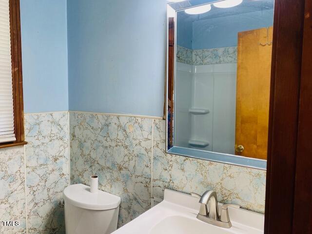 480 Peed Road Rougemont, NC 27572 - Photo 20 of 38 a bathroom with a sink and a mirror