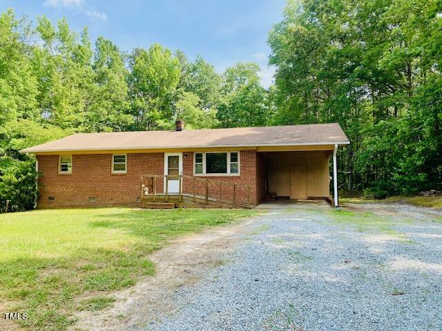 480 Peed Road Rougemont, NC 27572 - Photo 2 of 38 a front view of a house with yard