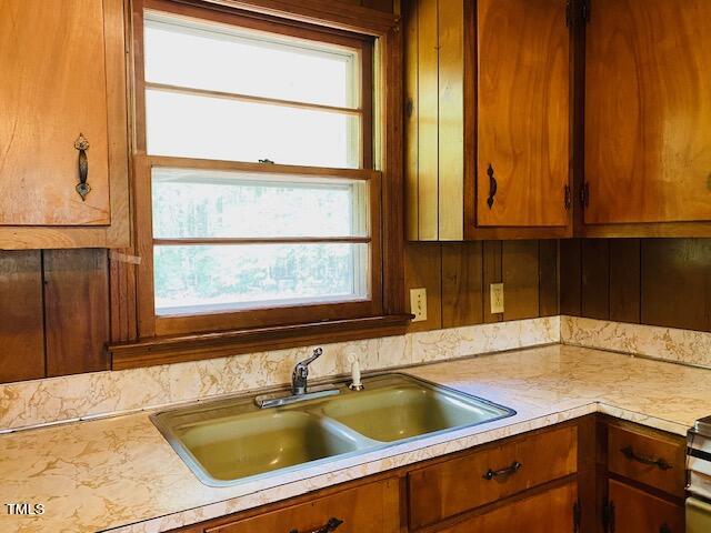 480 Peed Road Rougemont, NC 27572 - Photo 32 of 38 a kitchen with a sink and a window