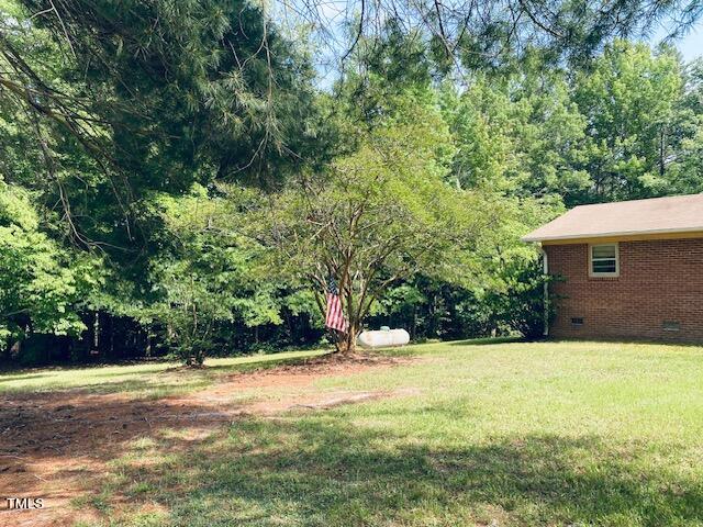 480 Peed Road Rougemont, NC 27572 - Photo 4 of 38 a view of swimming pool with a yard