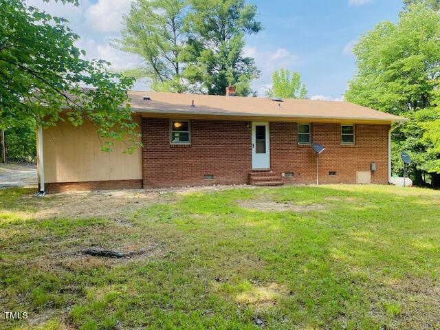 480 Peed Road Rougemont, NC 27572 - Photo 10 of 38 a front view of a house with garden