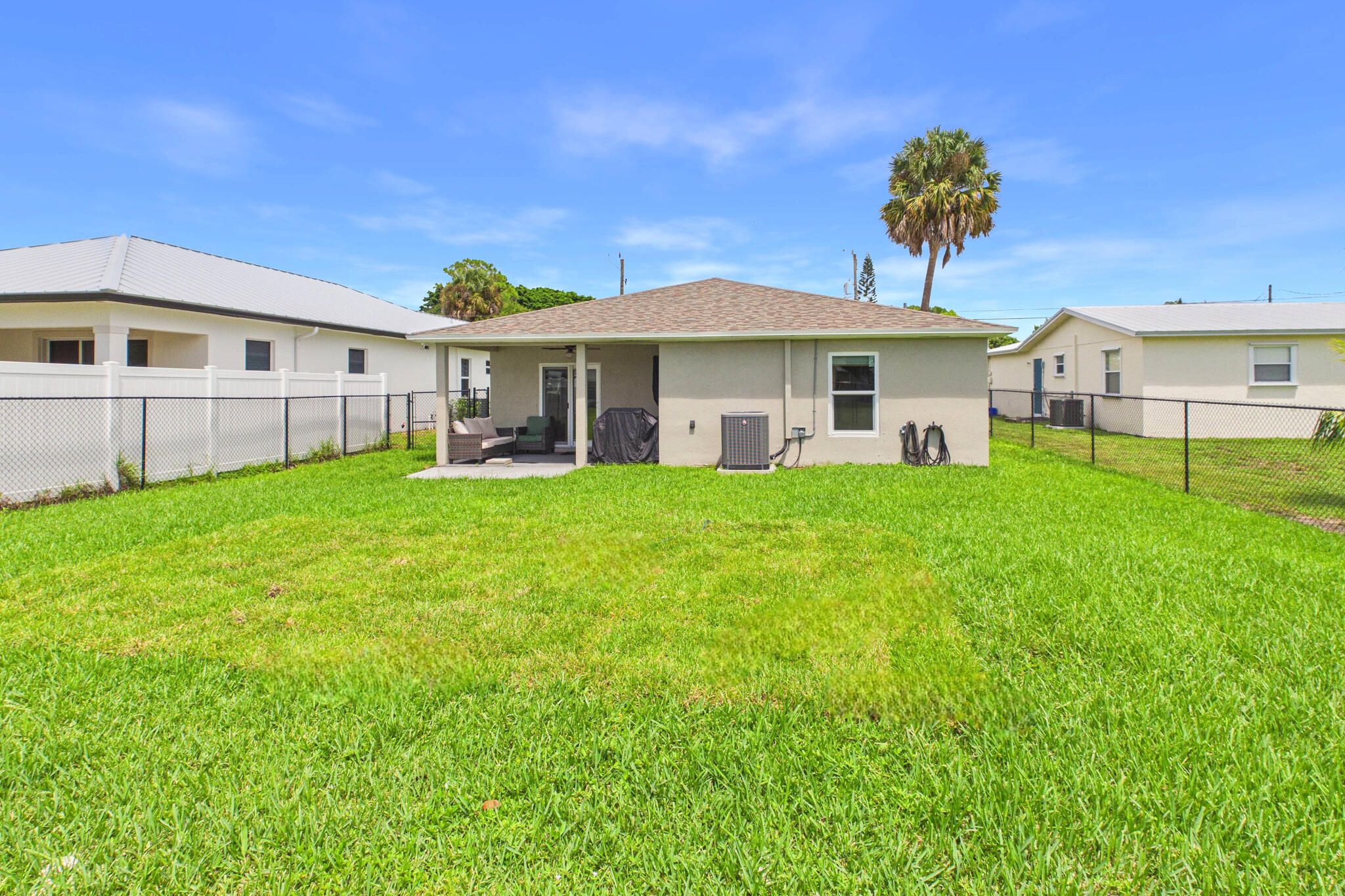6784 3rd Street Jupiter, FL 33458 - Photo 67 of 70 EXTERIOR_BACK_2