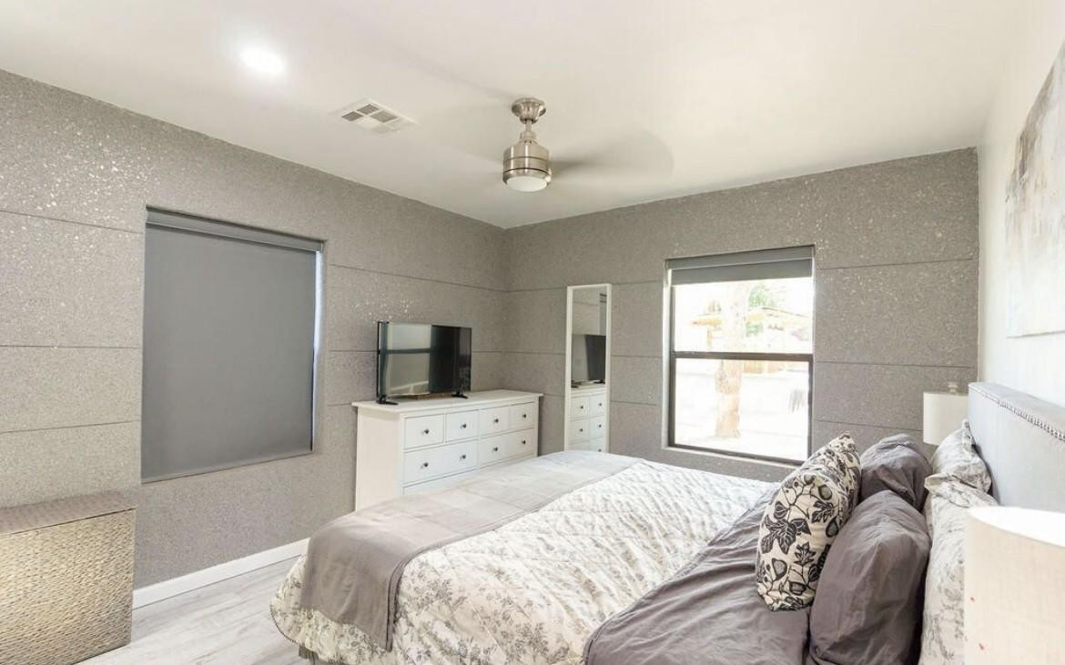 4214 North 20th Street Phoenix, AZ 85016 - Photo 18 of 40 a bedroom with a bed and a window