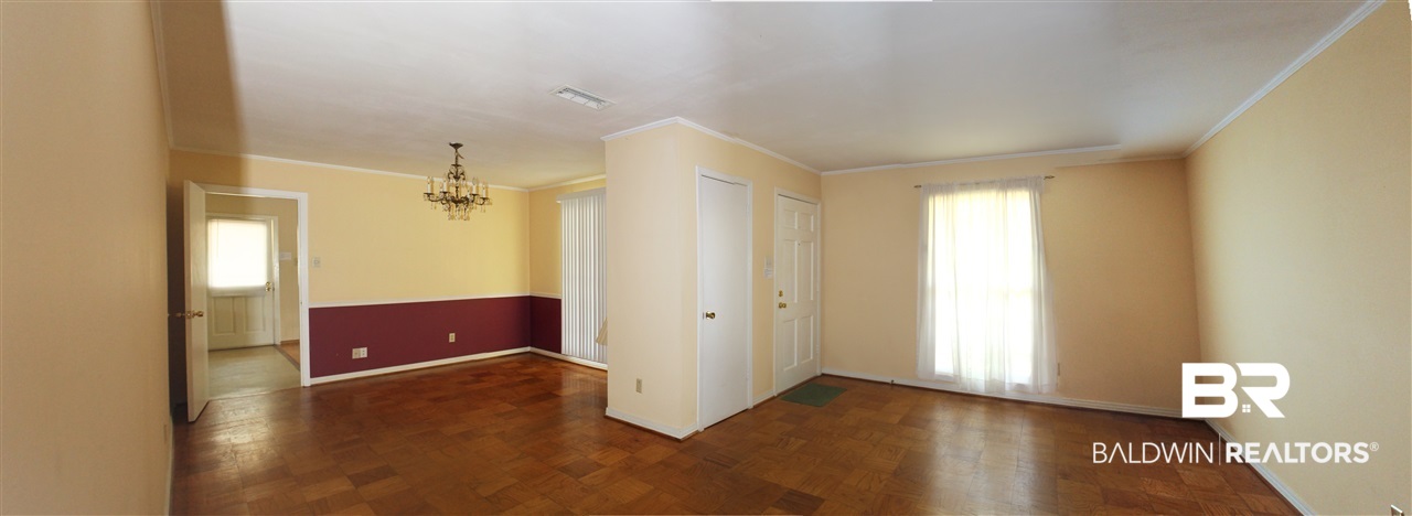 120 Glen Oaks Road Mobile, AL 36608 - Photo 3 of 16 The living room is open to the dining room.