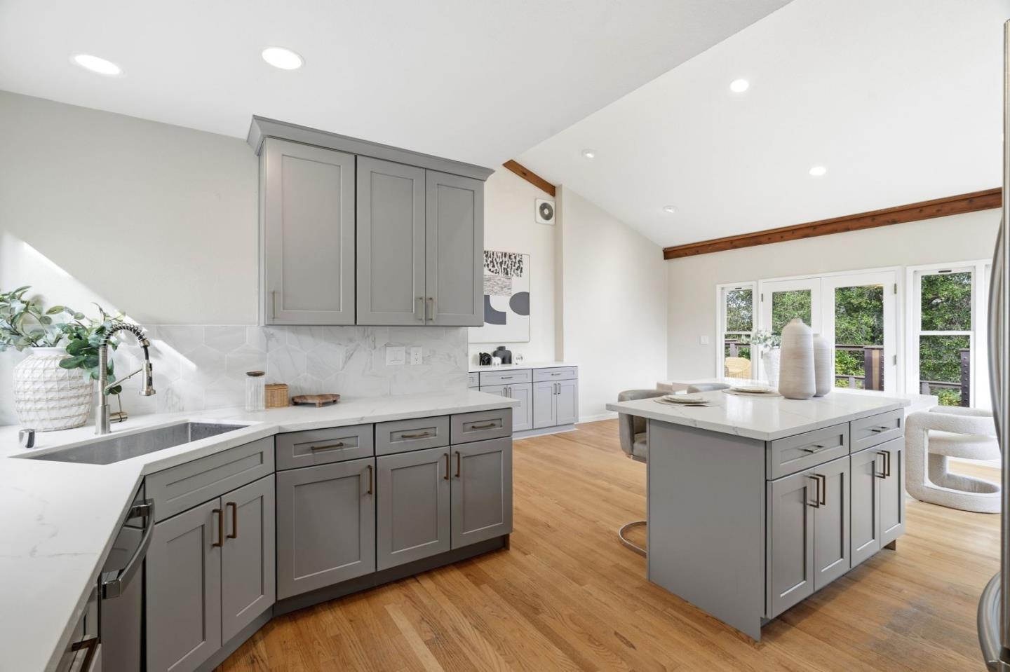10140 Hillcrest Road Cupertino, CA 95014 - Photo 13 of 39 a kitchen with a sink stove and cabinets