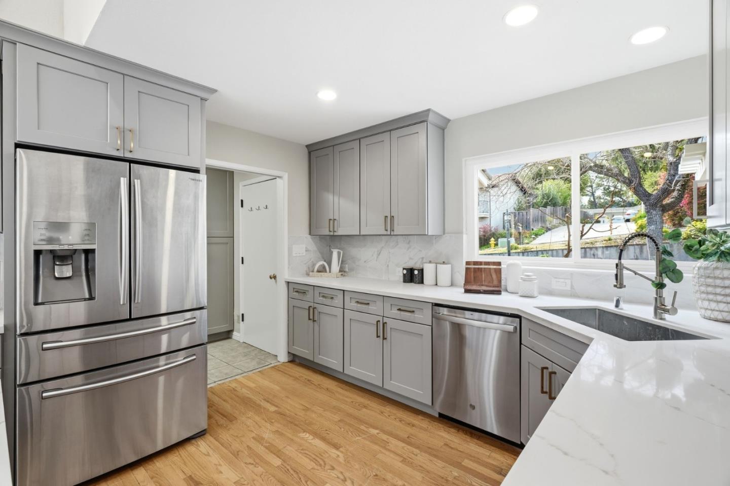 10140 Hillcrest Road Cupertino, CA 95014 - Photo 15 of 39 a kitchen with stainless steel appliances a refrigerator sink and cabinets