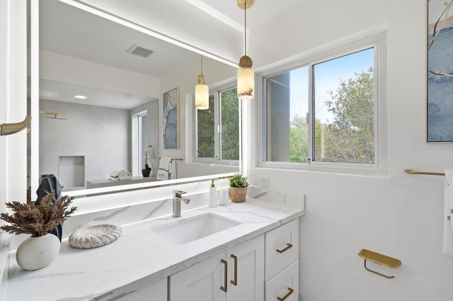 10140 Hillcrest Road Cupertino, CA 95014 - Photo 27 of 39 a bathroom with a sink double vanity and a mirror