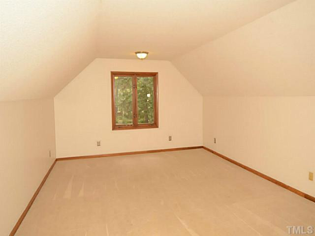 8521 Kempton Road Raleigh, NC 27615 - Photo 15 of 25 Super bonus room. Half bath is close by, too. Bonus Room