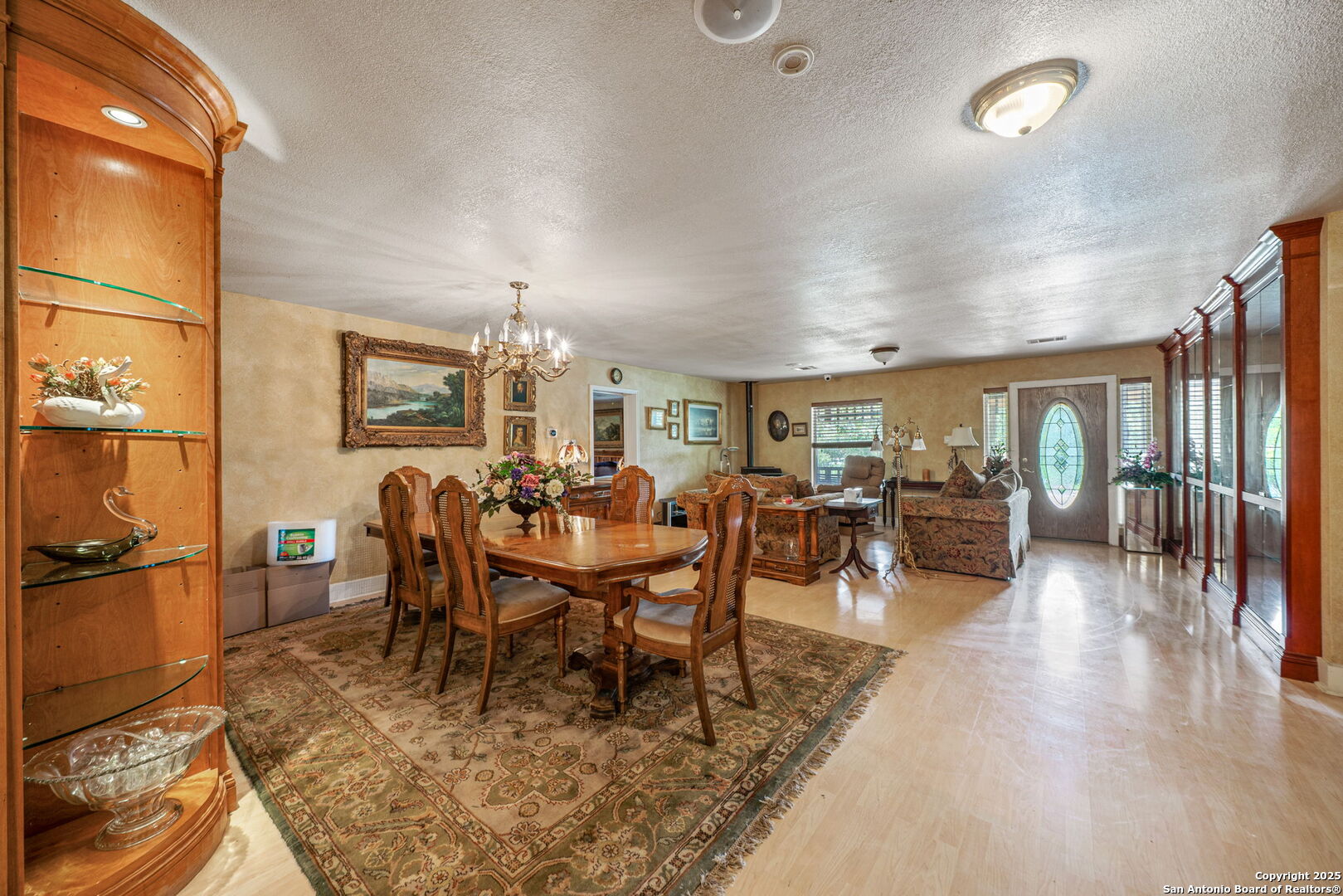 1551 North Windy Knoll Drive Devine, TX 78016 - Photo 24 of 42 a view of a dining room with furniture