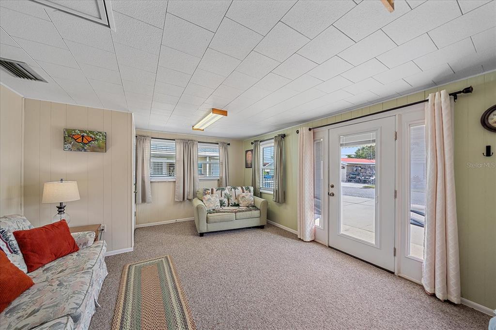 1260 Yoder Avenue Sarasota, FL 34239 - Photo 13 of 42 a living room with furniture and a couch