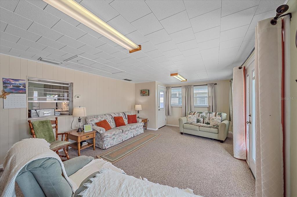 1260 Yoder Avenue Sarasota, FL 34239 - Photo 15 of 42 a living room with furniture and a couch