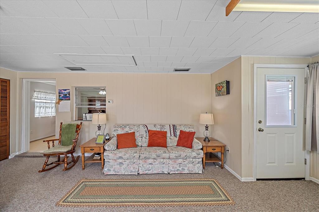 1260 Yoder Avenue Sarasota, FL 34239 - Photo 20 of 42 a living room with furniture and a rug