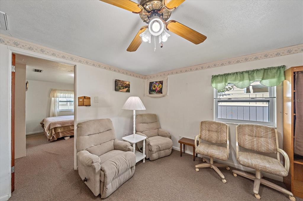 1260 Yoder Avenue Sarasota, FL 34239 - Photo 24 of 42 a bedroom with furniture and a bed