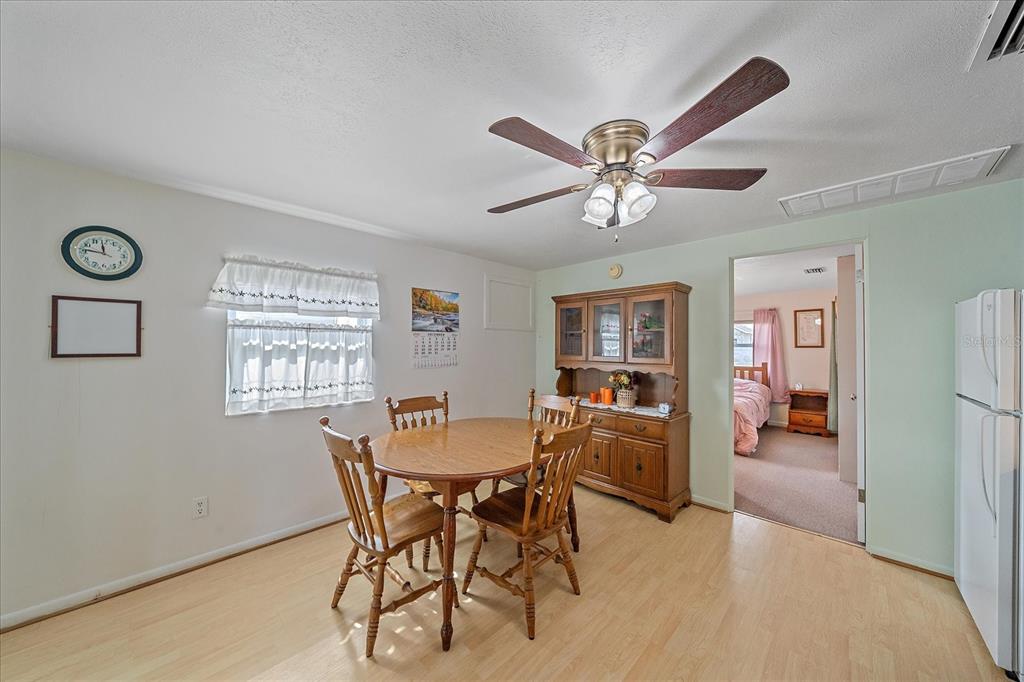 1260 Yoder Avenue Sarasota, FL 34239 - Photo 35 of 42 a dining room with furniture and window