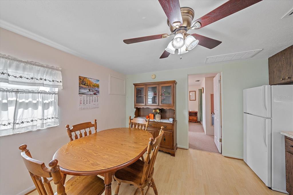 1260 Yoder Avenue Sarasota, FL 34239 - Photo 38 of 42 a dining room with furniture and window