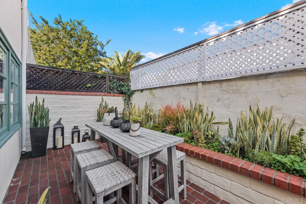6125 La Flecha Rancho Santa Fe, CA 92067 - Photo 19 of 20 a terrace with outdoor seating and wooden floor