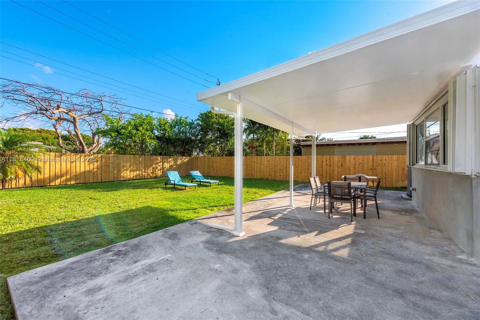 1545 Normandy Drive Miami Beach, FL 33141 - Photo 30 of 37 a view of a backyard with sitting area
