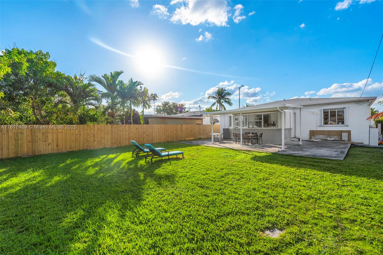 1545 Normandy Drive Miami Beach, FL 33141 - Photo 31 of 37 a view of swimming pool with outdoor seating
