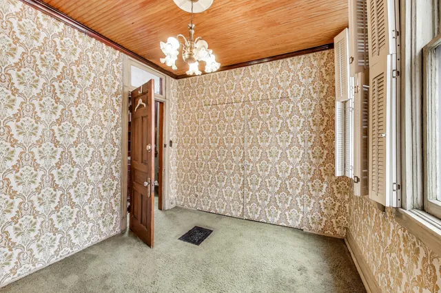 a view of balcony with brick wall