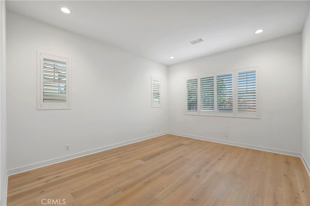 14432 Windfall Lane Huntington Beach, CA 92647 - Photo 28 of 62 a view of empty room with wooden floor