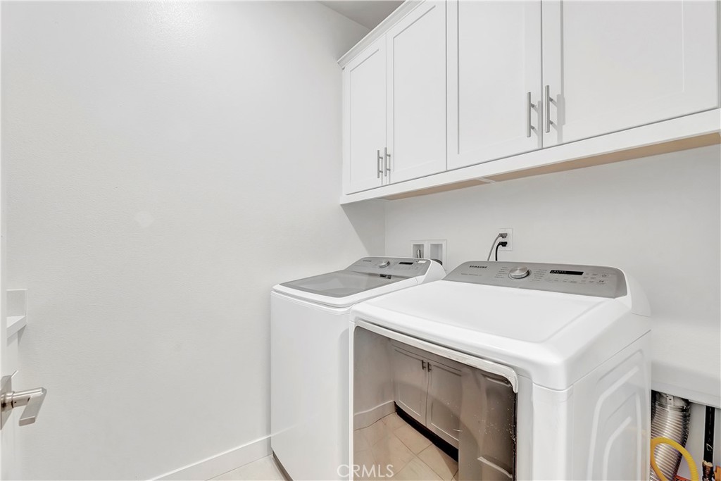 14432 Windfall Lane Huntington Beach, CA 92647 - Photo 36 of 62 a utility room with dryer and washer