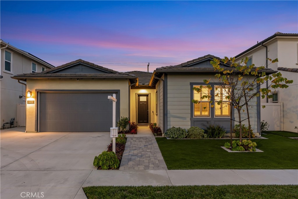 14432 Windfall Lane Huntington Beach, CA 92647 - Photo 55 of 62 a front view of a house with garden