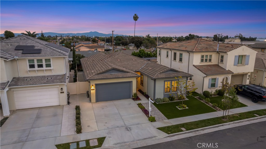 14432 Windfall Lane Huntington Beach, CA 92647 - Photo 57 of 62 a front view of a house with a yard