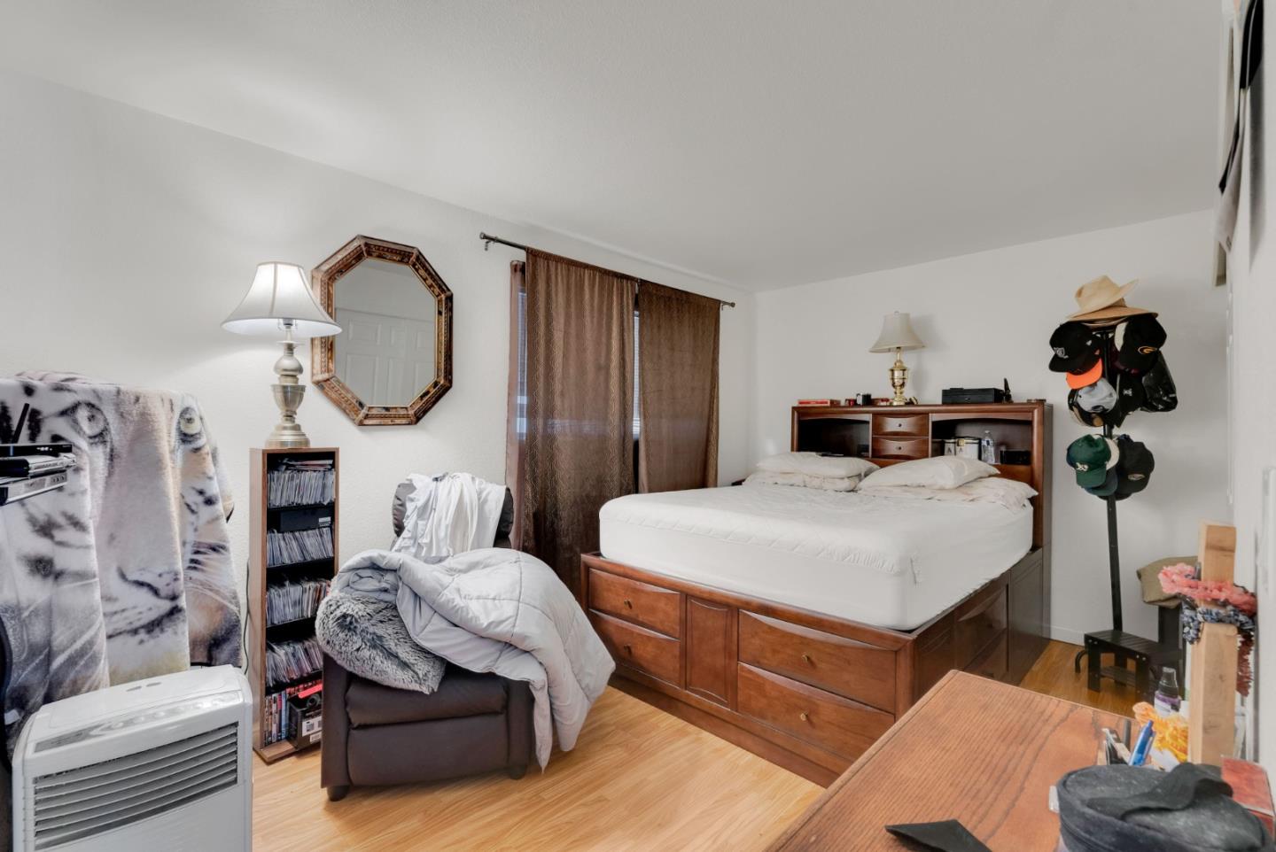 4140 Fran Way Richmond, CA 94803 - Photo 11 of 23 a living room with furniture a mirror and white walls