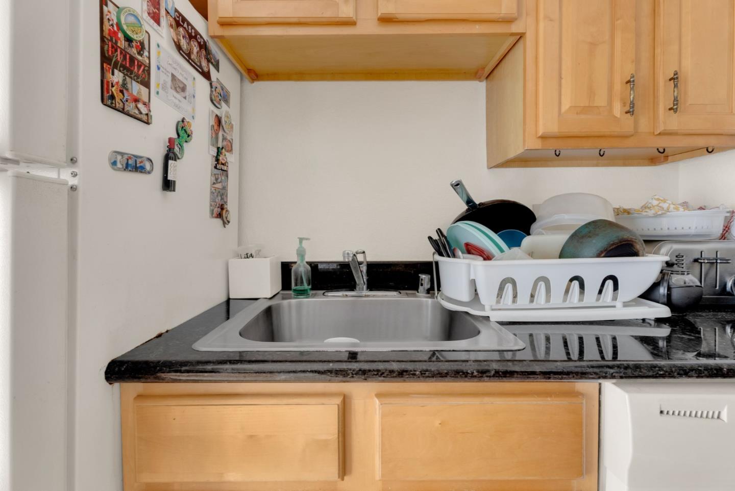 4140 Fran Way Richmond, CA 94803 - Photo 18 of 23 a view of kitchen island with sink and cabinets
