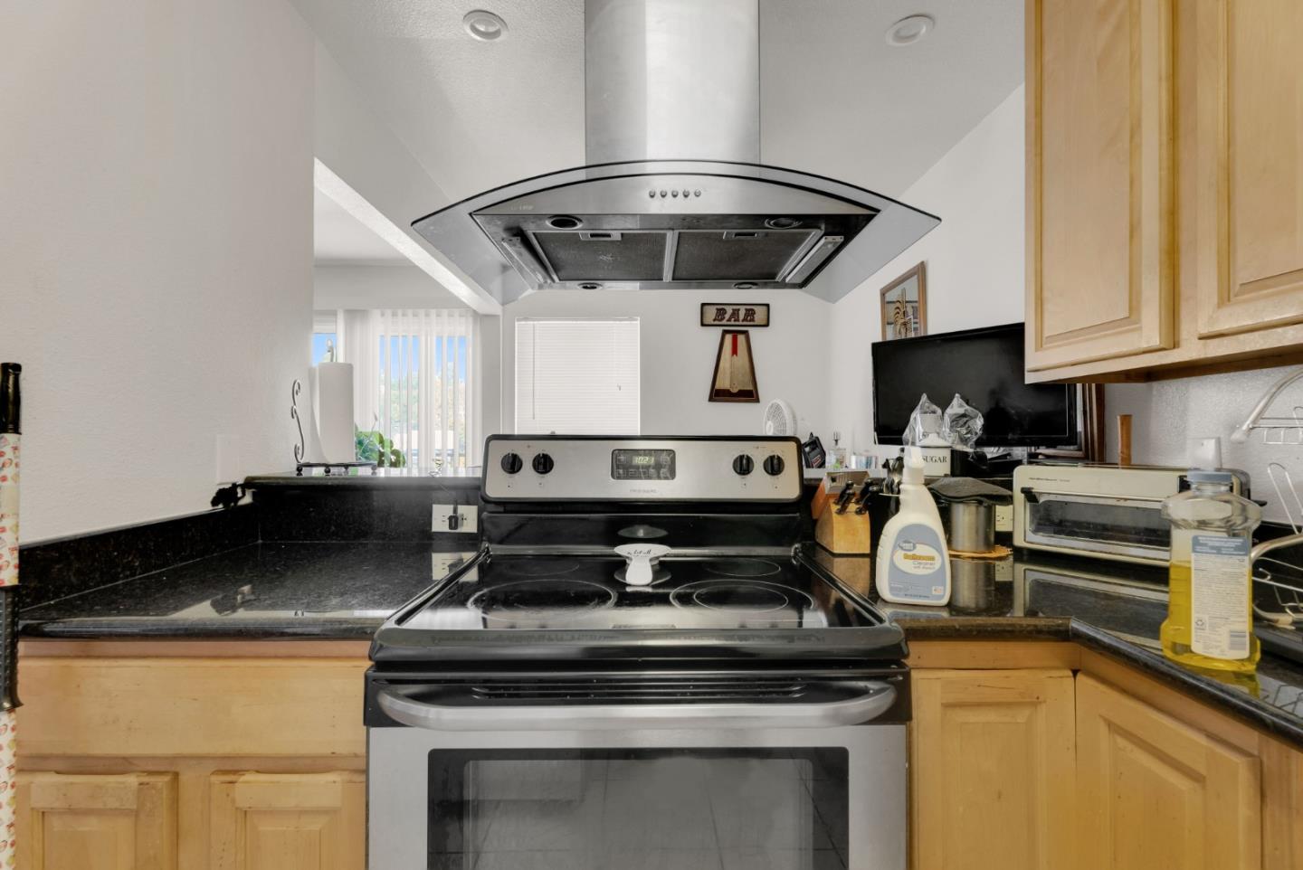 4140 Fran Way Richmond, CA 94803 - Photo 8 of 23 a stove top oven sitting inside of a kitchen