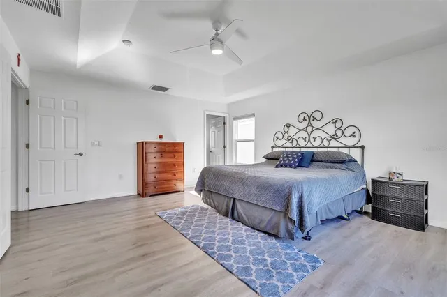 a bedroom with a bed and closet