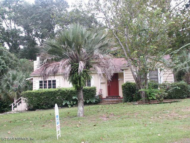 1695 Mayfair Road Jacksonville, FL 32207 - Photo 1 of 1 a front view of a house with garden